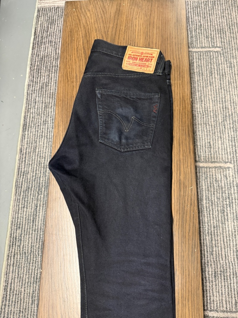 Iron Heart 555 broken twill overdyed black.  Hemmed to 32 in inseam.